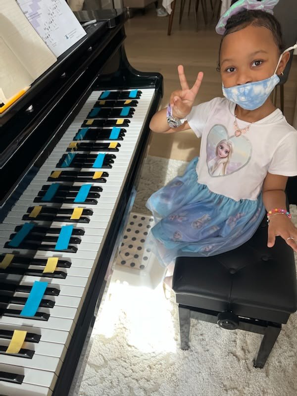 Bella So Fancy playing the grand piano